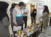 راه اندازی غرفه آموزشی کالای قاچاق در شبکه بهداشت و درمان شهرستان آباده